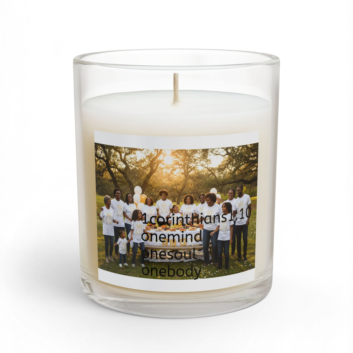 A white wax candle in a clear glass jar with a single wick, 1 corinthians 10:10 onemind onesoul onebody