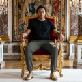 Lion Face jogger - Graphic fleece sweatpants with a person sitting on a royal chair with a ancient backgound