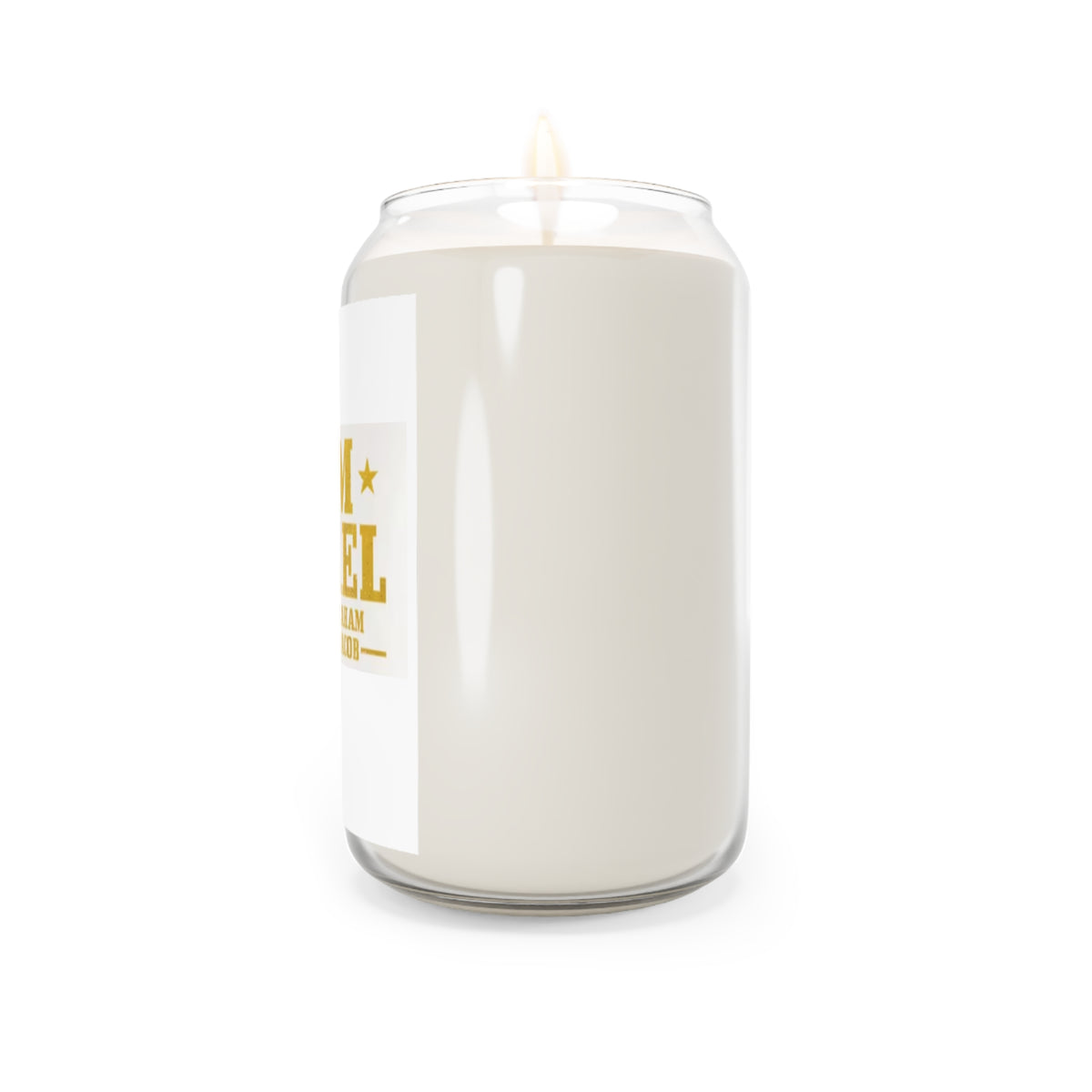 A large white candle in a clear glass jar with a single wick and a white label featuring gold text, shown against a plain white background.